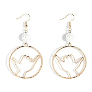Hawaiian Shaka hand gesture drop earrings with pearls and gold metal finish