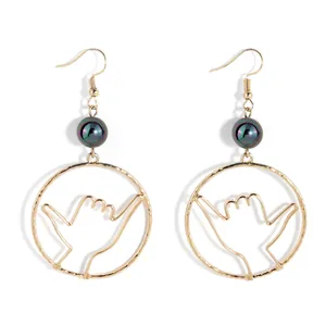 Hawaii Shaka hand sign drop earrings with iridescent pearls in gold finish