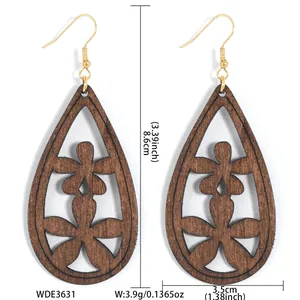 Boucles d'oreilles rétro en bois en forme de goutte avec motifs de fleurs ajourées
