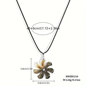 Detail view of flower pendant necklace with dimensions 3.8cm and 45cm rope chain length