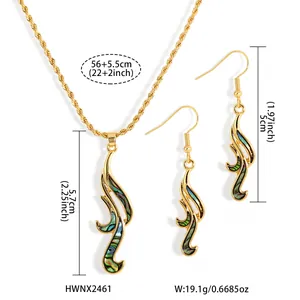 Detail view of gold-plated sunflower jewelry set with abalone shell dimensions and weight