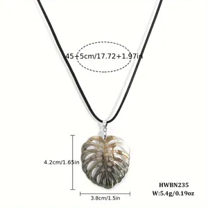 Detail view of shell turtle leaf pendant with dimensions 4.2x3.8cm and 45+5cm cord