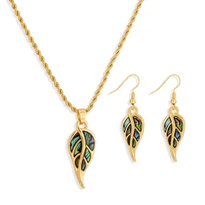Detail of sunflower leaf jewelry set with natural abalone shell and gold plated finish