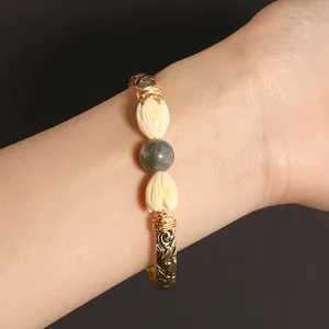 Retro gold cuff bracelet with jasmine resin flowers and natural tiger eye stone beads