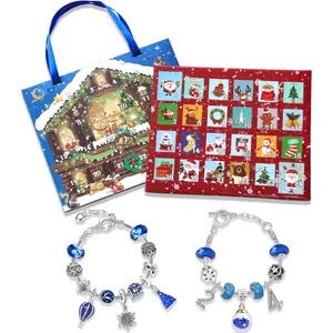 Blue cottage Christmas advent calendar set with two festive charm bracelets for kids