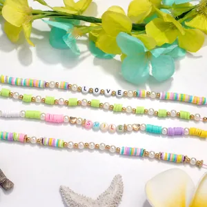 Handmade clay heishi bead bracelet set with LOVE and SMILE charms for girls gift