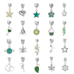 Detailed grid of 20 assorted alloy enamel charms for DIY jewelry and bracelets