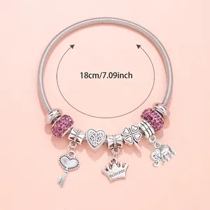 Pink heart charm bracelet with sparkling beads and Princess crown pendant in silver finish