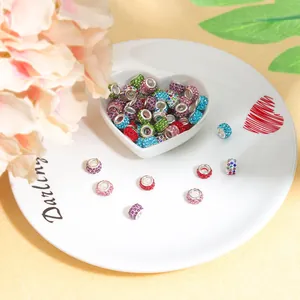 Detailed view of multi-color crystal rhinestone clay beads for DIY bracelet making