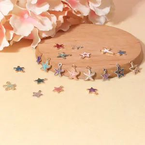 Macro view of colorful starfish charms in enamel for DIY jewelry making and bracelets