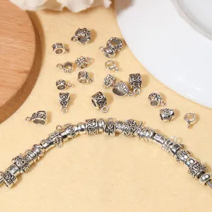 Vintage silver alloy heart and floral relief charms for DIY jewelry making