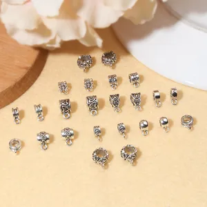 Vintage silver alloy bail beads with hollow floral patterns for DIY jewelry making
