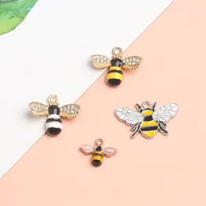 Bee charm set for jewelry making including gold alloy honeybee and crystal pendants