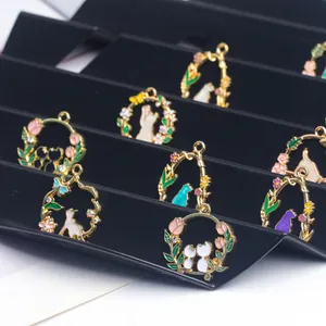 Macro shot of assorted golden alloy flower and animal pendants for DIY jewelry