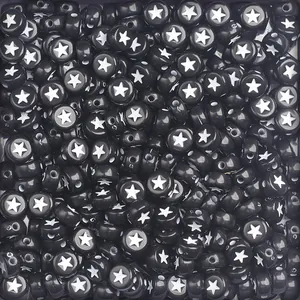 Close-up of 7mm black round acrylic star beads for DIY handmade jewelry and bracelet crafting