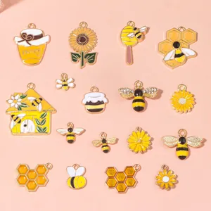 Detailed set of honeybee and sunflower enamel charms for DIY jewelry making