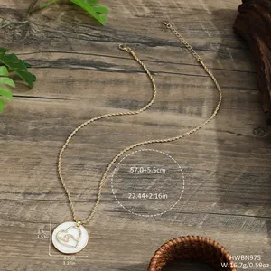 Detail of gold shell necklace with rope chain showing specific size and weight parameters
