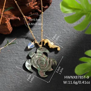 Detailed view of Hawaiian natural shell sea turtle necklace with measurement markings