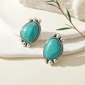 Boucles d'oreilles bohèmes en turquoise en forme de goutte et métal argenté vieilli