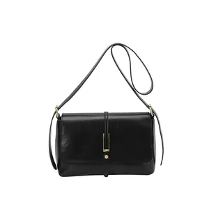 Retro black faux leather shoulder bag with gold metal buckle and minimalist rectangular shape