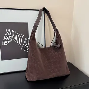 Vintage brown leather hobo shoulder bag with white stitching and large capacity for daily commute
