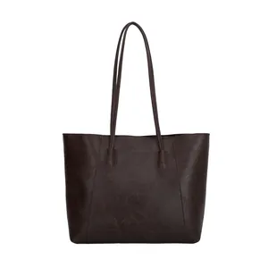 Retro dark brown faux leather tote bag with long shoulder straps and spacious design