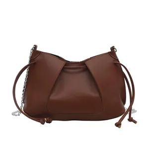 Chic dark brown pleated tote bag with silver chain strap and drawstring detail