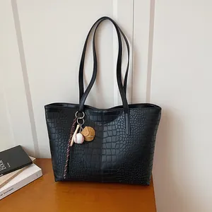 Black large capacity faux crocodile leather tote bag with baseball themed charm for women