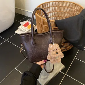 Minimalist Women PU Leather Bucket Bag Vintage Underarm Shoulder Crossbody Bag With Plush Dog Pendant Commuter Handbag