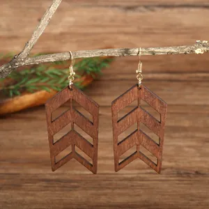 Boho style hollow wooden geometric earrings in dark brown with gold hooks