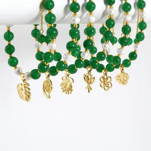 Retro beaded bracelets with natural pearls, green stones and gold-plated leaf charms