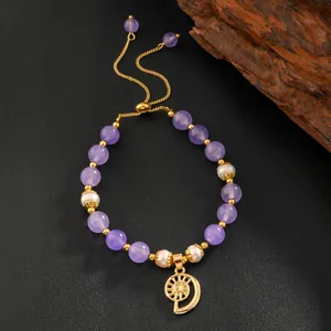 Bracelet fait main en améthyste et perles avec pendentif soleil doré et chaîne réglable