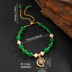 Close-up of pearl and green stone bracelet with nautilus shell pendant and size details