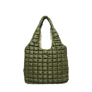 Quilted puffer tote bag in olive green with large capacity and textured fabric design