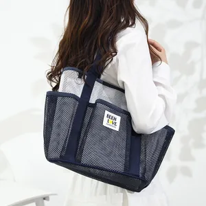 Navy and white mesh beach tote bag with multi-pockets and large capacity