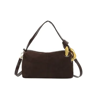 Retro dark brown suede baguette handbag with stylish gold chain and crossbody strap