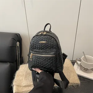 Chic black woven PU leather backpack for women with gold zippers and large capacity
