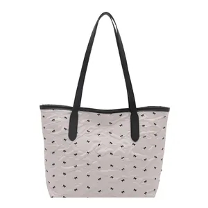 Off-white pleated tote bag with black bow patterns and slim leather shoulder straps