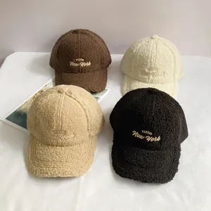 Detailed view of winter lamb wool baseball caps with POZZIO New York embroidery