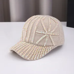 Beige knitted baseball cap featuring sparkling rhinestones and warm winter yarn texture
