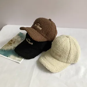 Winter sherpa baseball caps with POZZIO embroidery in brown, black and beige colors