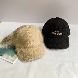 Winter lamb wool baseball cap with POZZID New York embroidery in black and beige colors