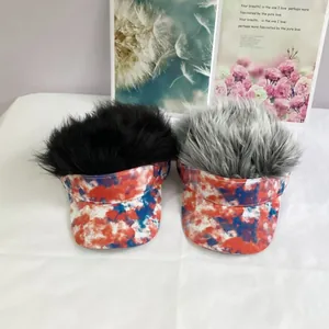 Tie-dye sun visors with long synthetic hair extensions in black and gray hair colors