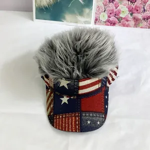 Close-up of hip-hop wig hat featuring American flag visor and grey long hair strands