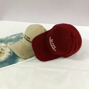 Detailed view of NO TIME FOR ROMANCE embroidery on warm fleece winter baseball caps