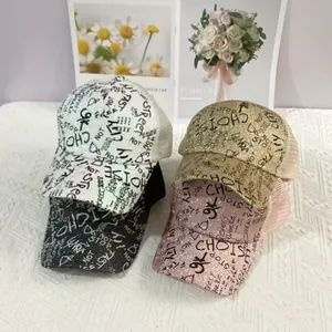 Glitter trucker hats with street style graffiti text and breathable mesh back for summer
