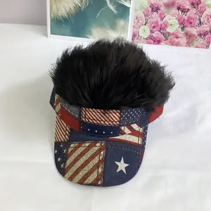 Top view of funny wig visor hat with American flag print on a white fabric background