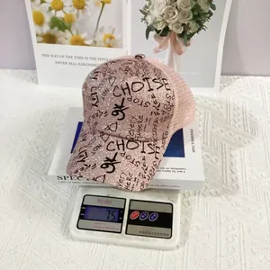 Pink glitter truck hat weighing 75g with graffiti letters and mesh breathable design