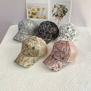 Glitter graffiti baseball caps in silver, black, white, gold, and pink with mesh back