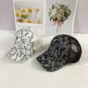 Graffiti print glitter mesh trucker hat with breathable mesh back in black and white colors